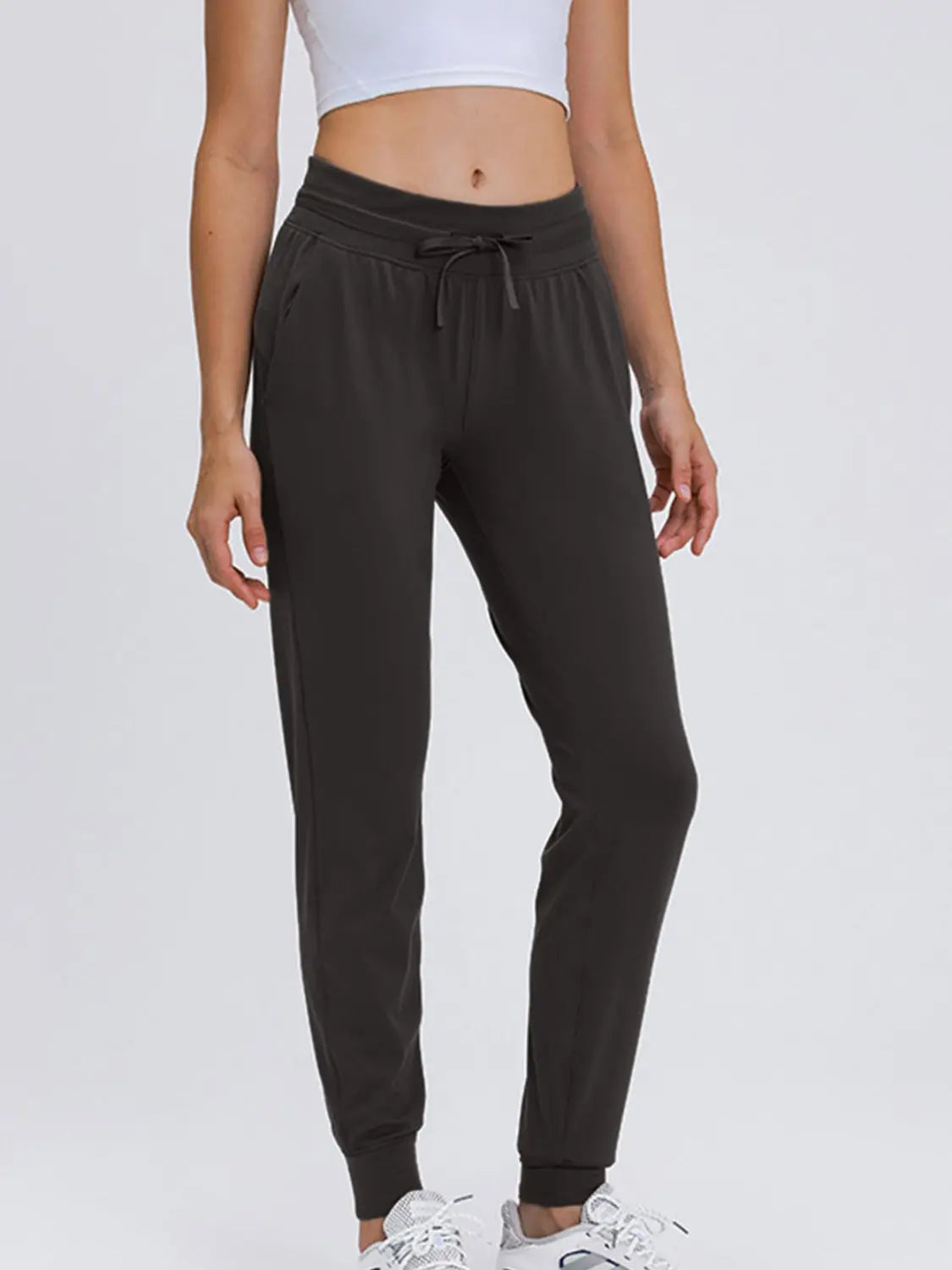 Millennia Double Take Tied Joggers with Pockets Trendsi