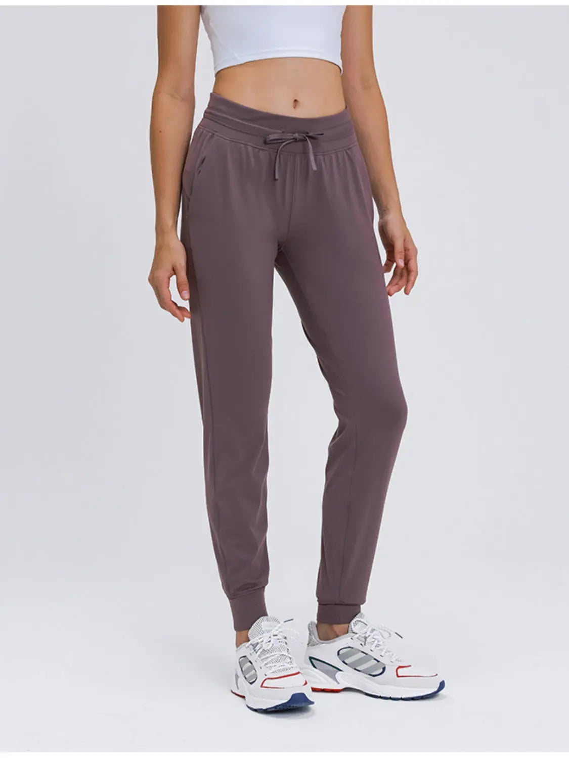 Millennia Double Take Tied Joggers with Pockets Trendsi